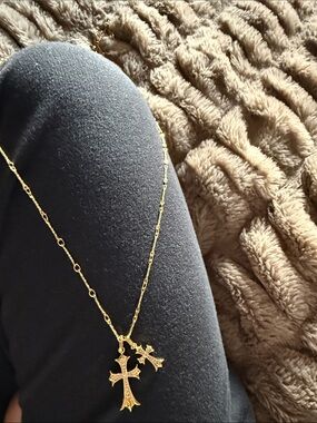 Gold double cross necklace